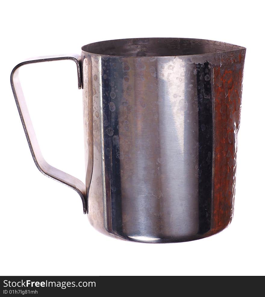 Stainless steel tankard isolated on the white. Old and used. Stainless steel tankard isolated on the white. Old and used.