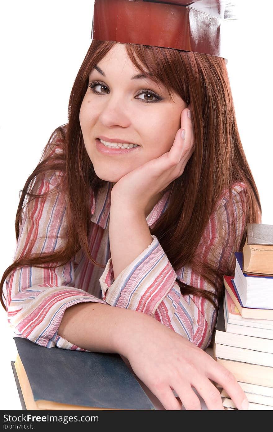 Attractive student with books . over white background