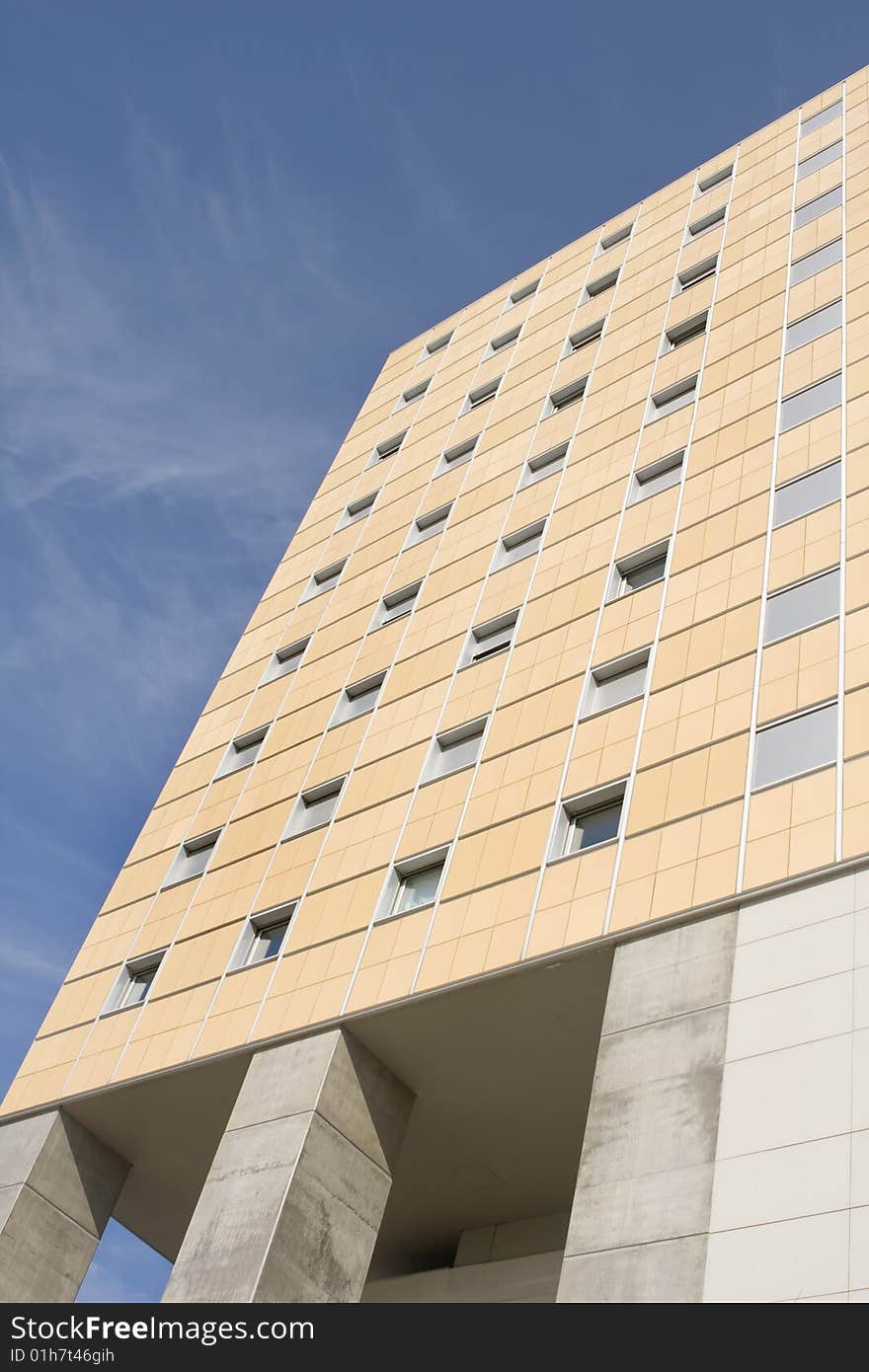 Modern office building on a background of blue sky