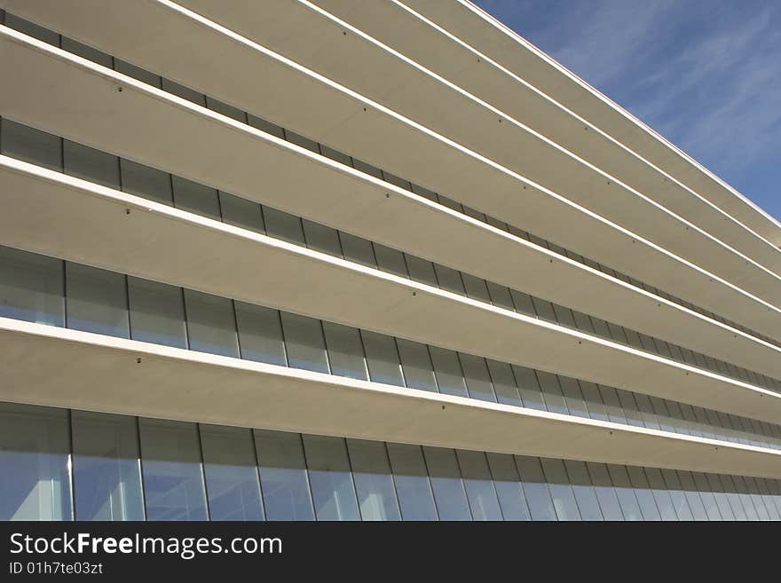 Modern office building on a background of blue sky