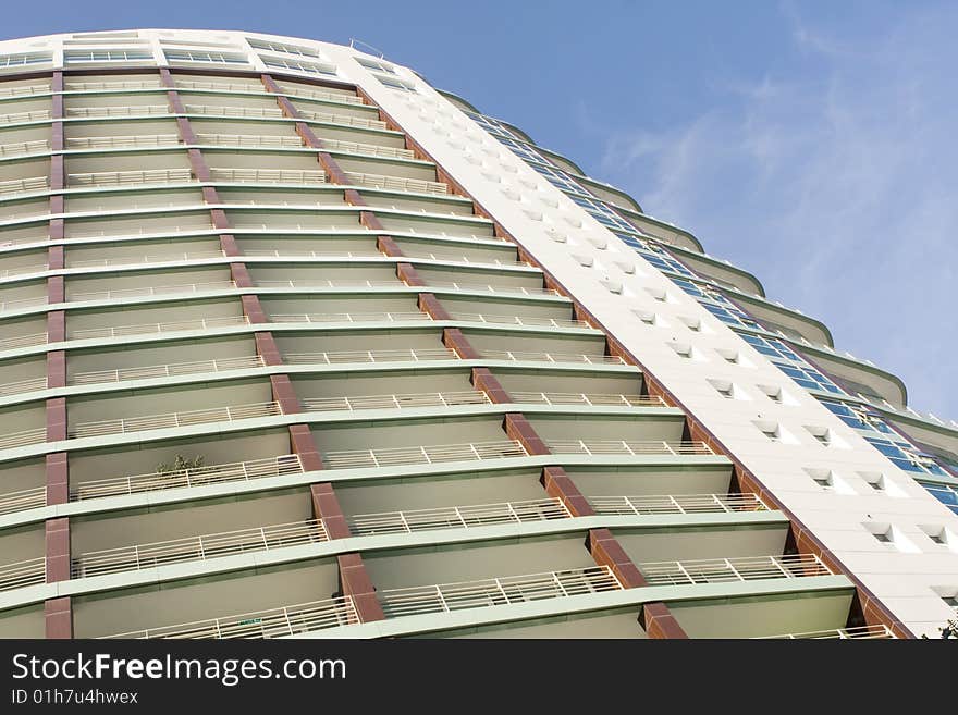 Modern office building on a background of blue sky