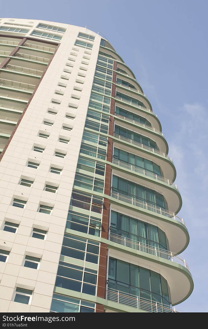 Modern office building on a background of blue sky