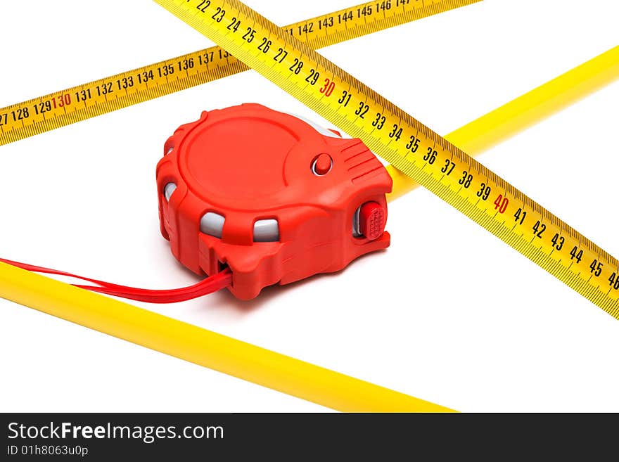 Red new tape-measure on a white background