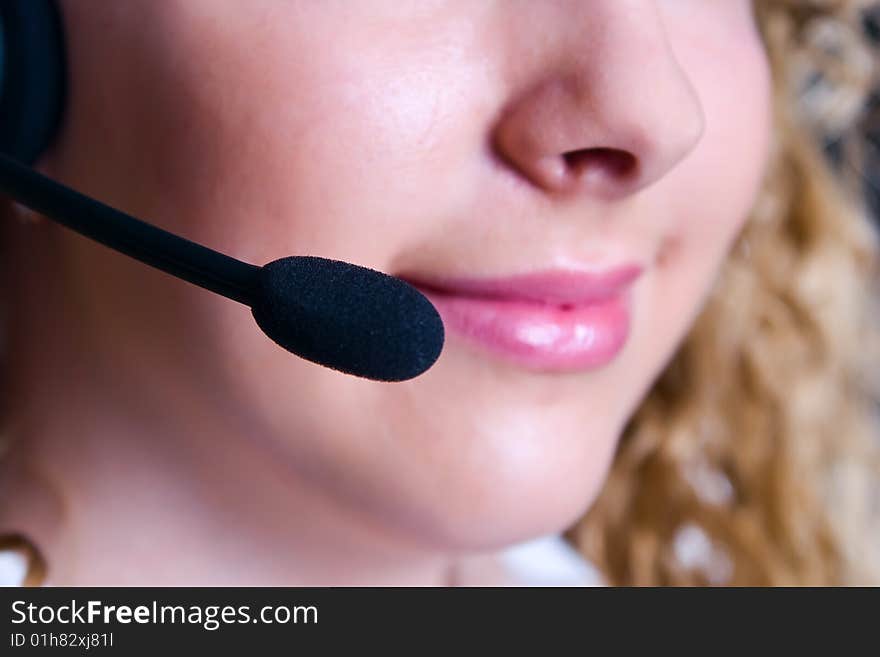 The employee of the call center on a white background