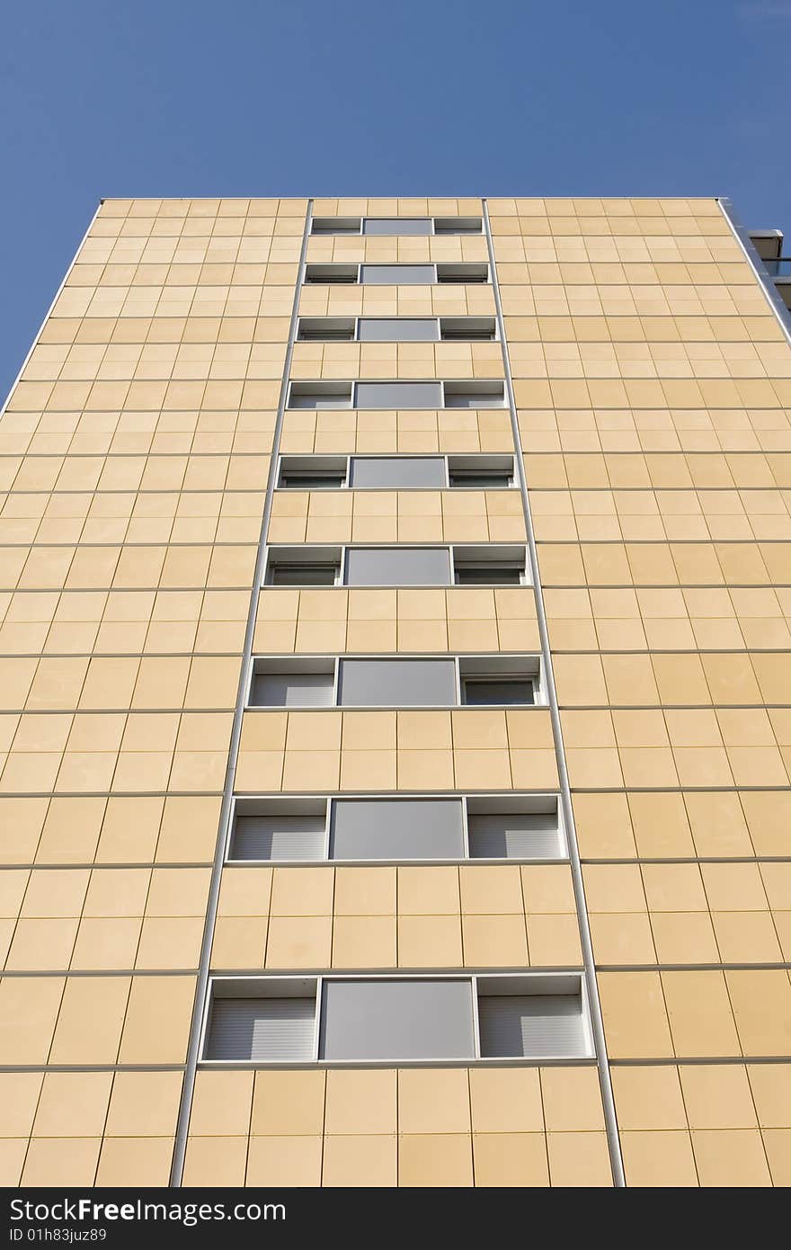 Modern office building on a background of blue sky