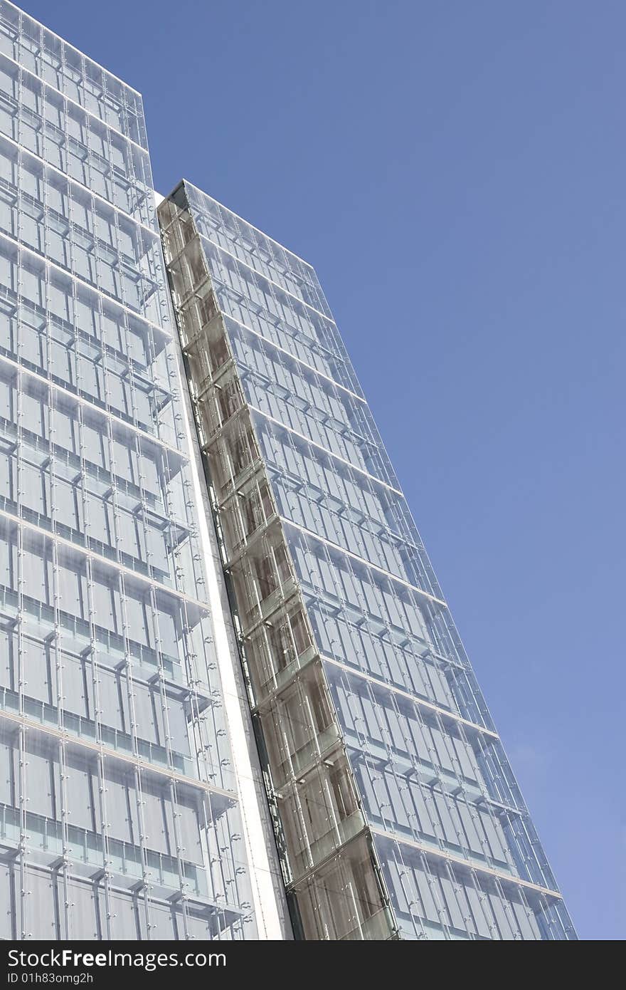 Modern office building on a background of blue sky