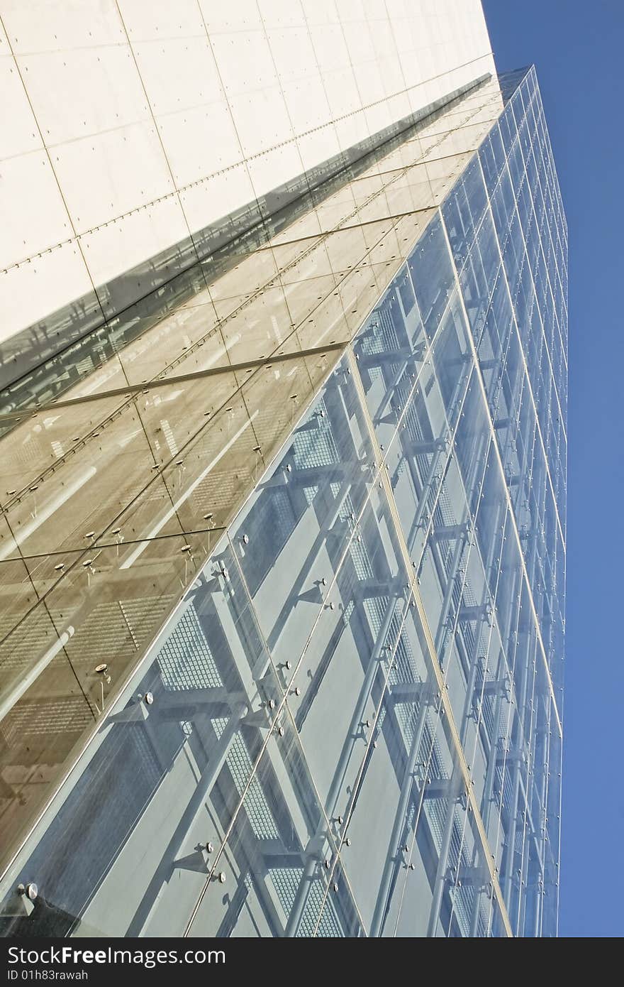 Modern office building on a background of blue sky