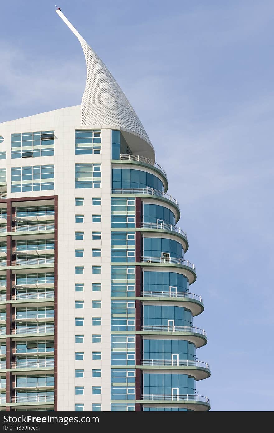 Modern office building on a background of blue sky