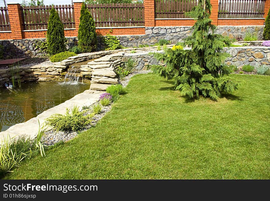 Garden with a lake and waterfall