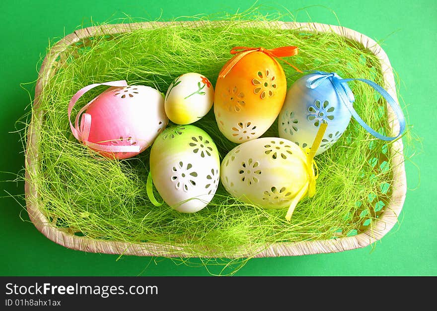 Easter still life, eggs on green background