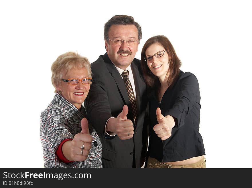 Senior business team with a young female worker giving thumbs up sign!. Senior business team with a young female worker giving thumbs up sign!