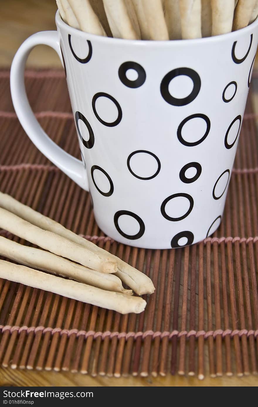 Bread sticks and a mug