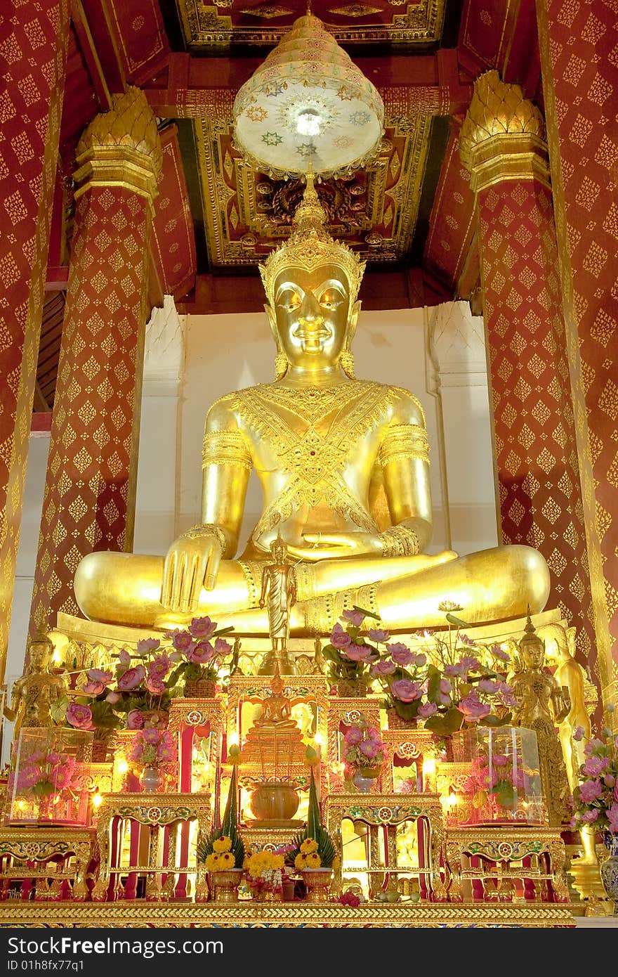 ฺBuddha image with ornaments in buddhist church, Aytthaya province, Thailand. ฺBuddha image with ornaments in buddhist church, Aytthaya province, Thailand.