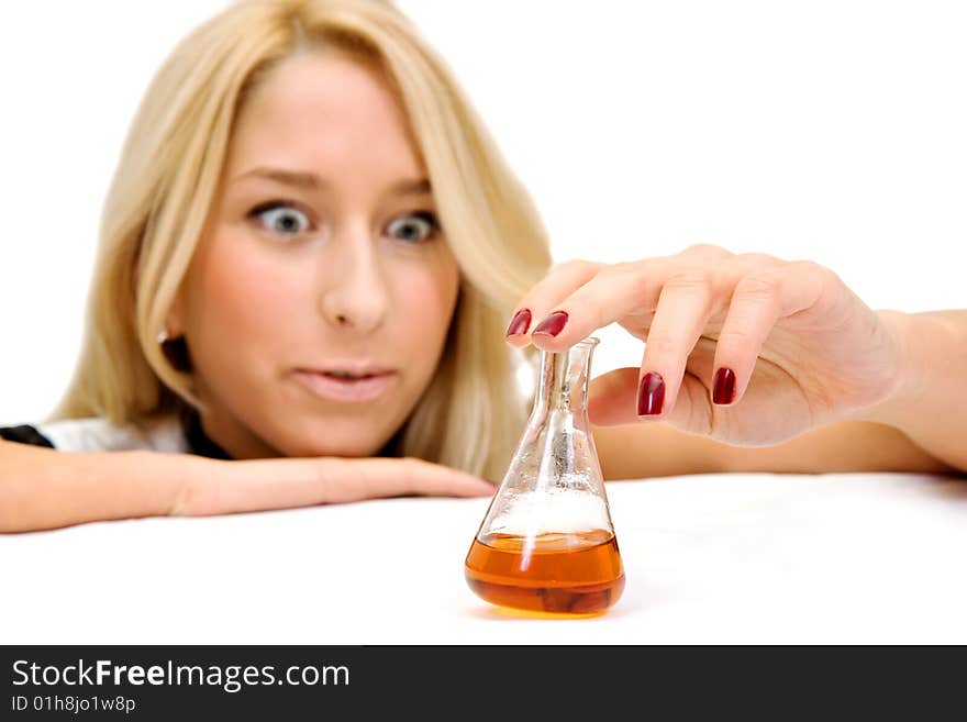 A young student is analyzing the reaction, isolated in white background. A young student is analyzing the reaction, isolated in white background