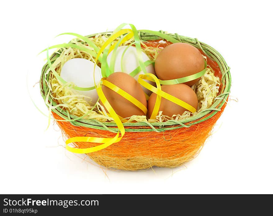 Easter ggs in basket on white background. Easter ggs in basket on white background