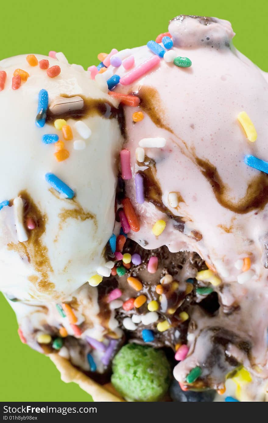 Close up shot of melting ice cream on green background