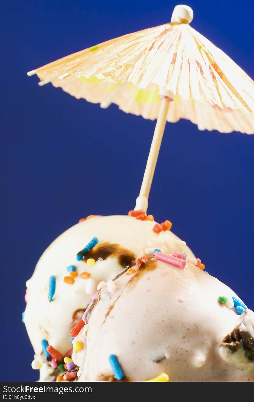 Close up shot of melting ice cream on green background