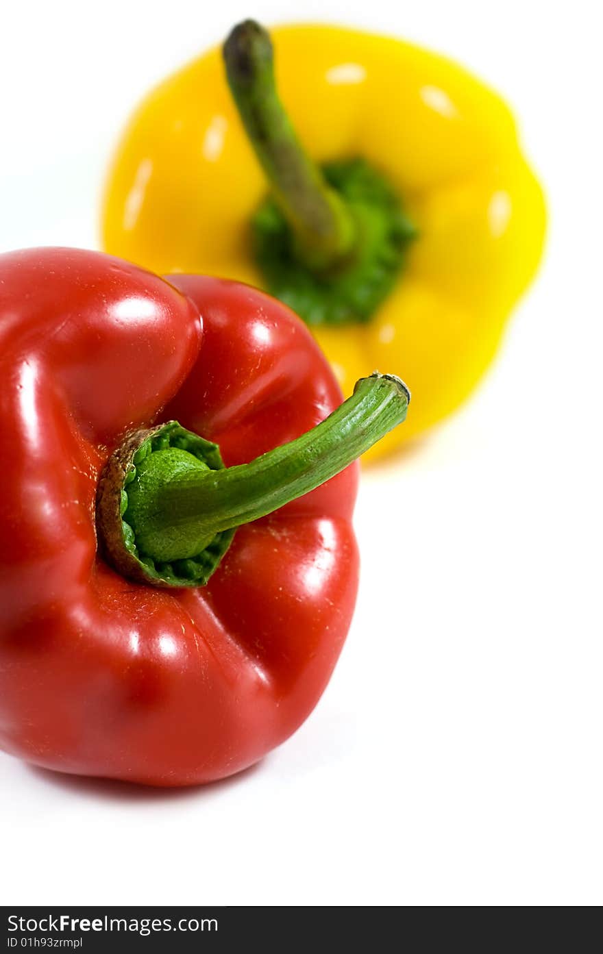 Red and yellow pepper isolated on white. Red and yellow pepper isolated on white