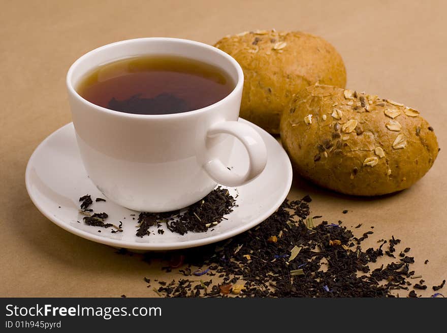 Cup of tea and bread closeup