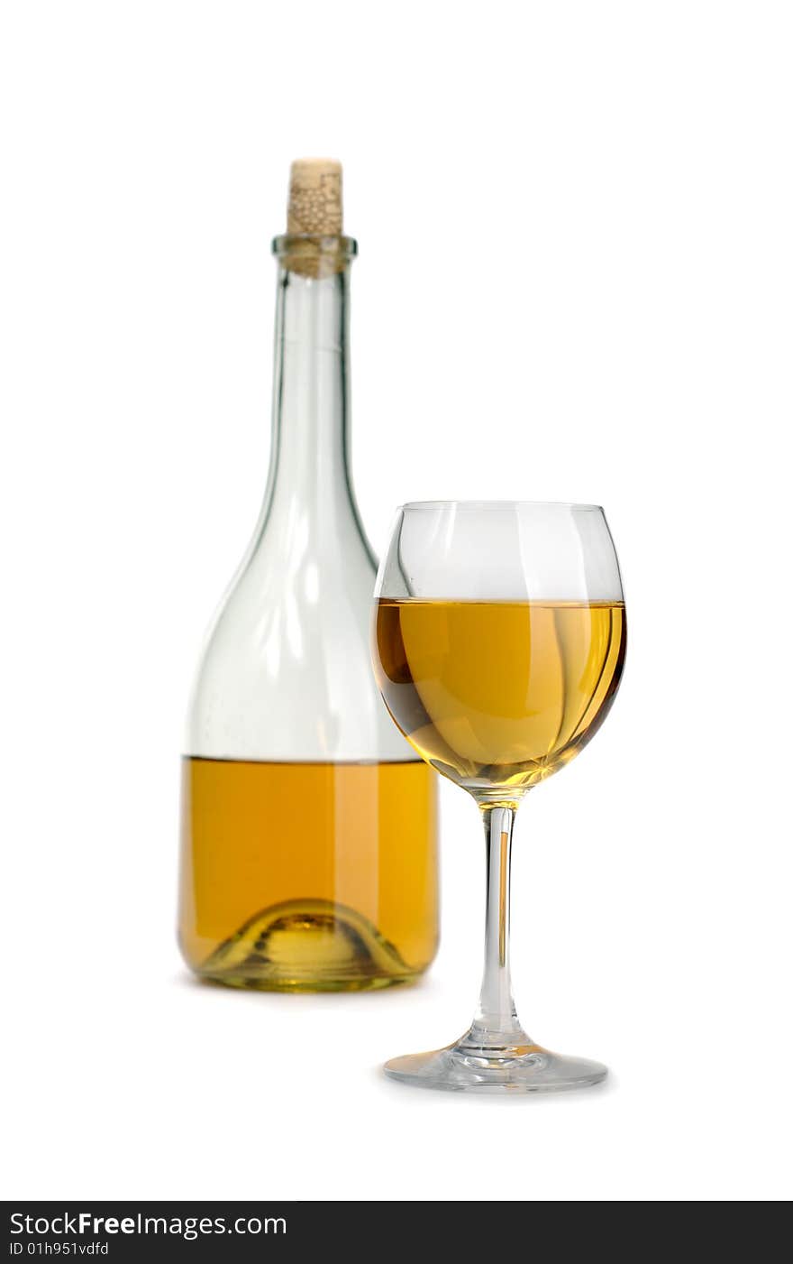 Glass and bottle of excellent white wine on a white background