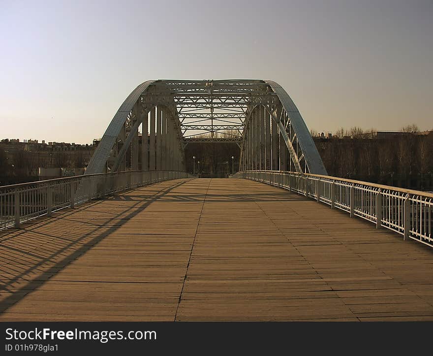 This small bridge is outside the typical Paris tourist area. This small bridge is outside the typical Paris tourist area