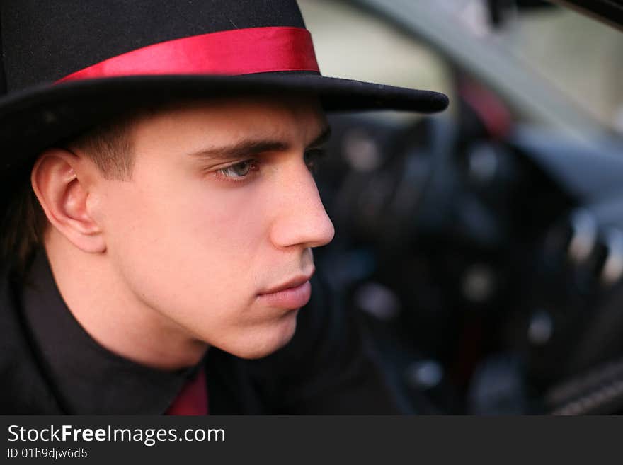 Young man in big hat. Young man in big hat