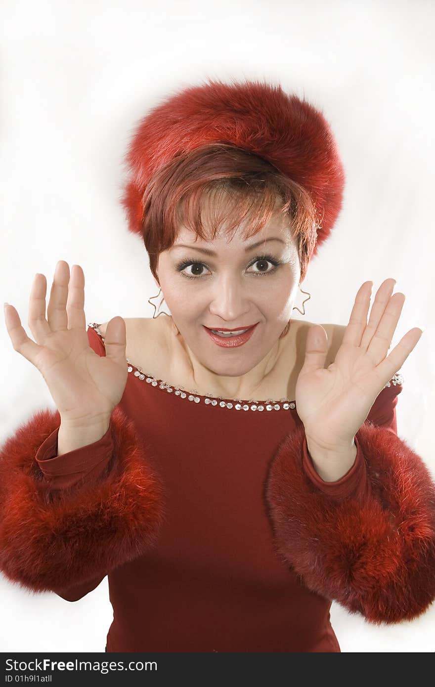 Portrait of a surprised woman in the red clothing