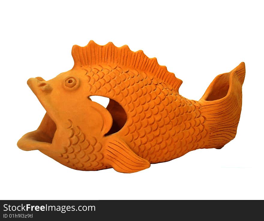 Decorative fish made of clay isolated