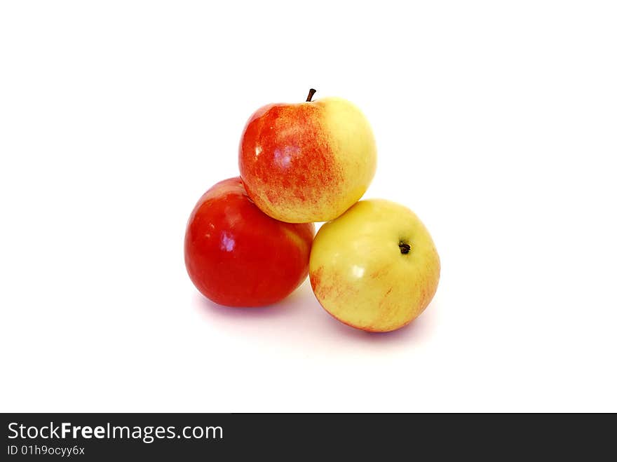 Three apples on a white background