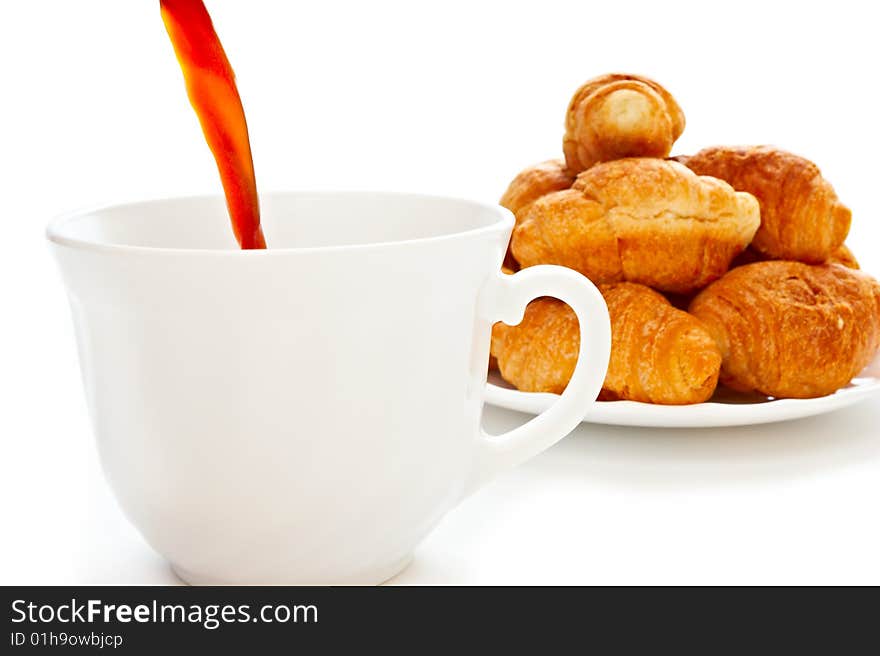 Pouring Brewed Coffee into a coffee cup