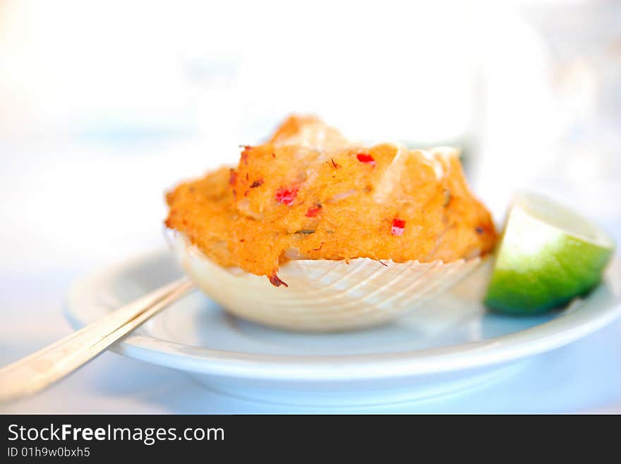 Crab meat seasoned with pepper served in the shell. Dish served throughout the tropical Brazilian coast. Crab meat seasoned with pepper served in the shell. Dish served throughout the tropical Brazilian coast.