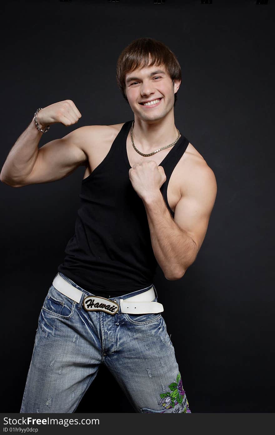 Handsome man on a black background