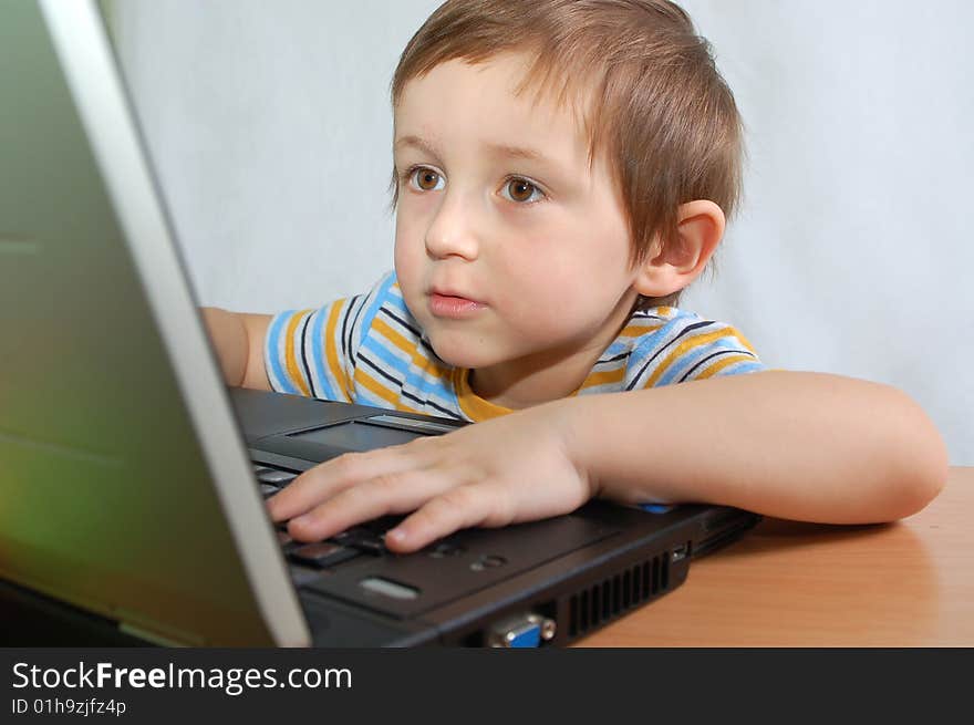 Little boy with notebook