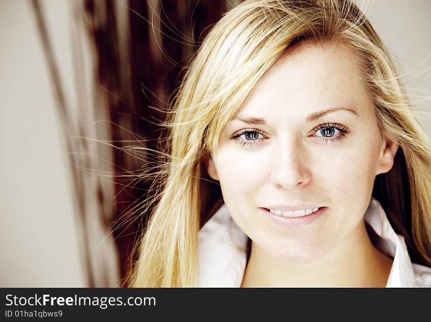 Young blond model looking into the camera