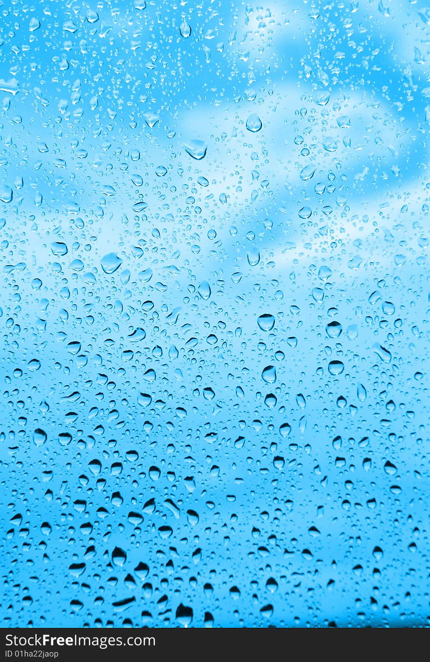 Many drops on the glass after rain