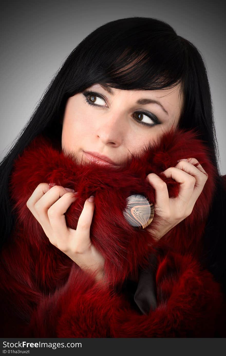 Brunette Is In A Red Fur Coat