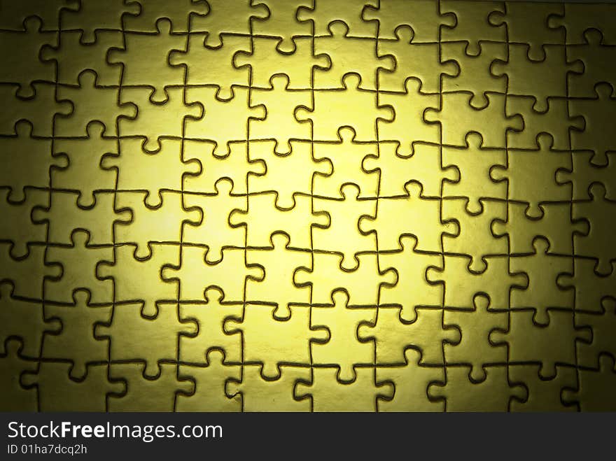 Background of gold jigsaw puzzle