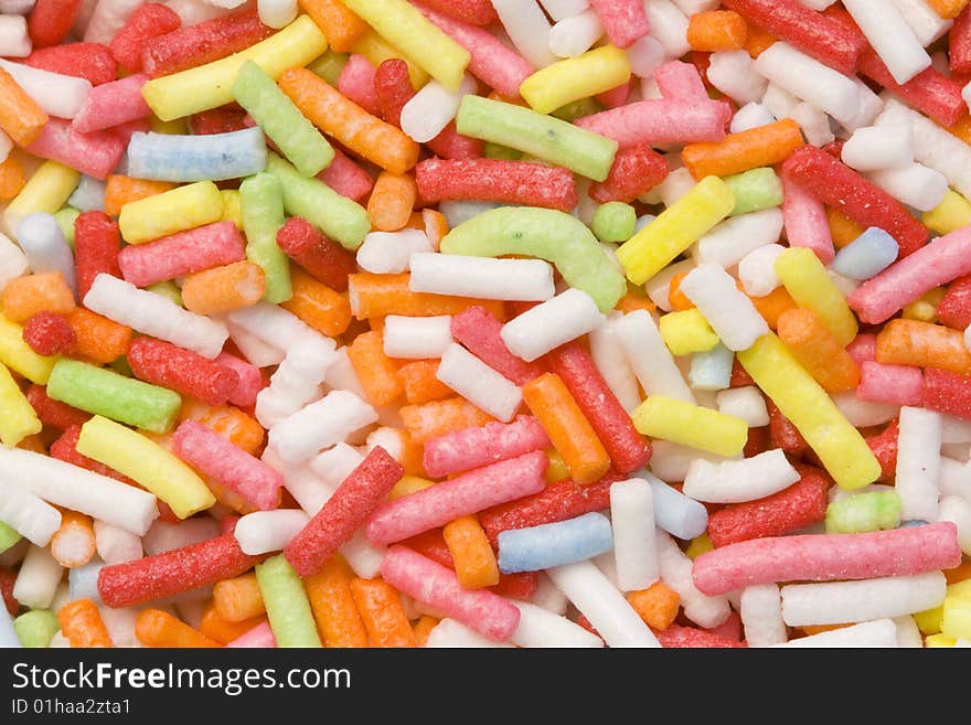 A close-up of a lot of colourful sugar decoration