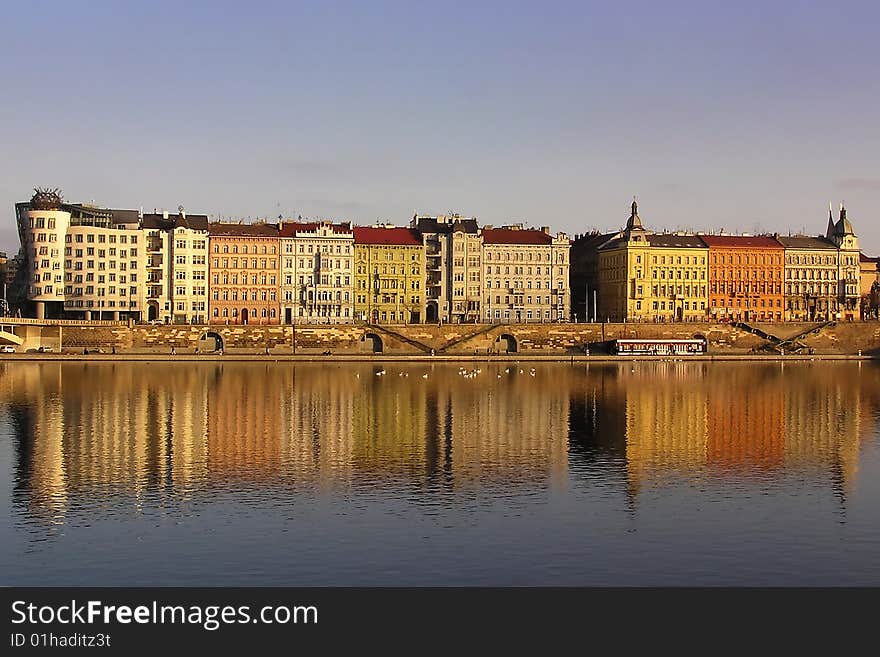 Pragues riverbank in sunset