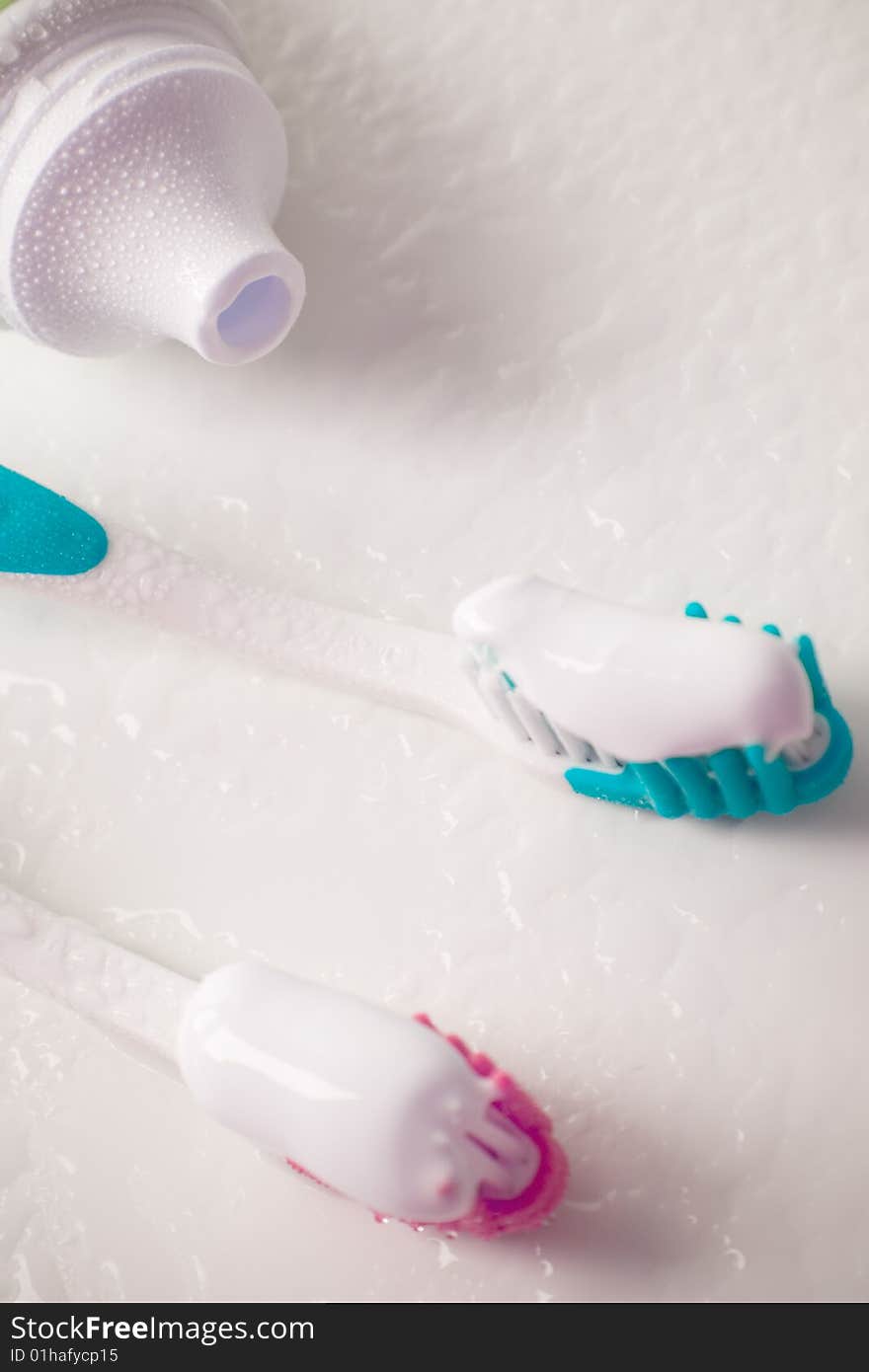 Toothpaste and toothbrushes closeup. dental care