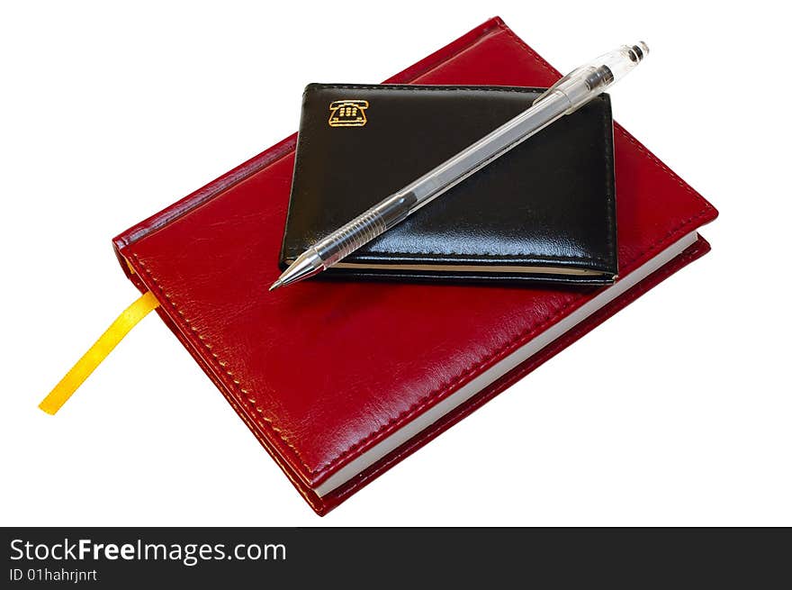 Two notebooks (organizers) and jell pen on isolated background. Two notebooks (organizers) and jell pen on isolated background.