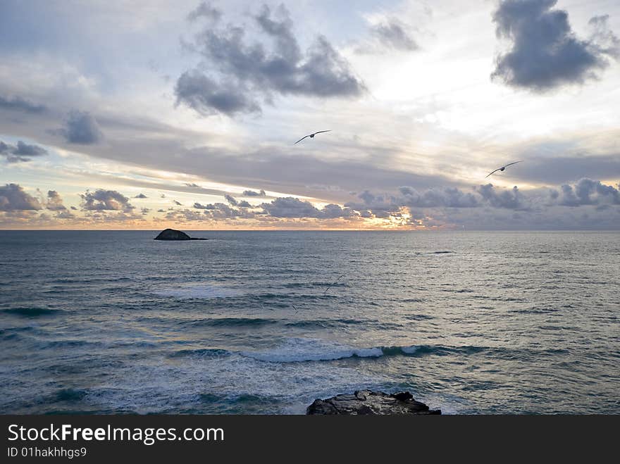 Sunset over Tasman Sea.West coast of New Zealand's North Island.Mariway beach next to Auckland.