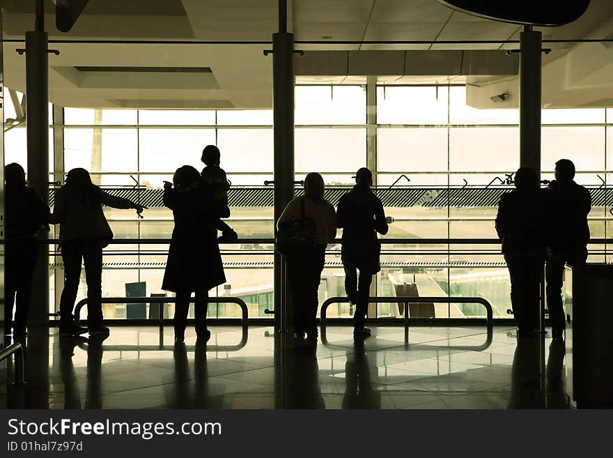 People waiting in the airport. People waiting in the airport