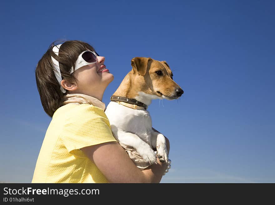 Woman with dog in your hands. Woman with dog in your hands