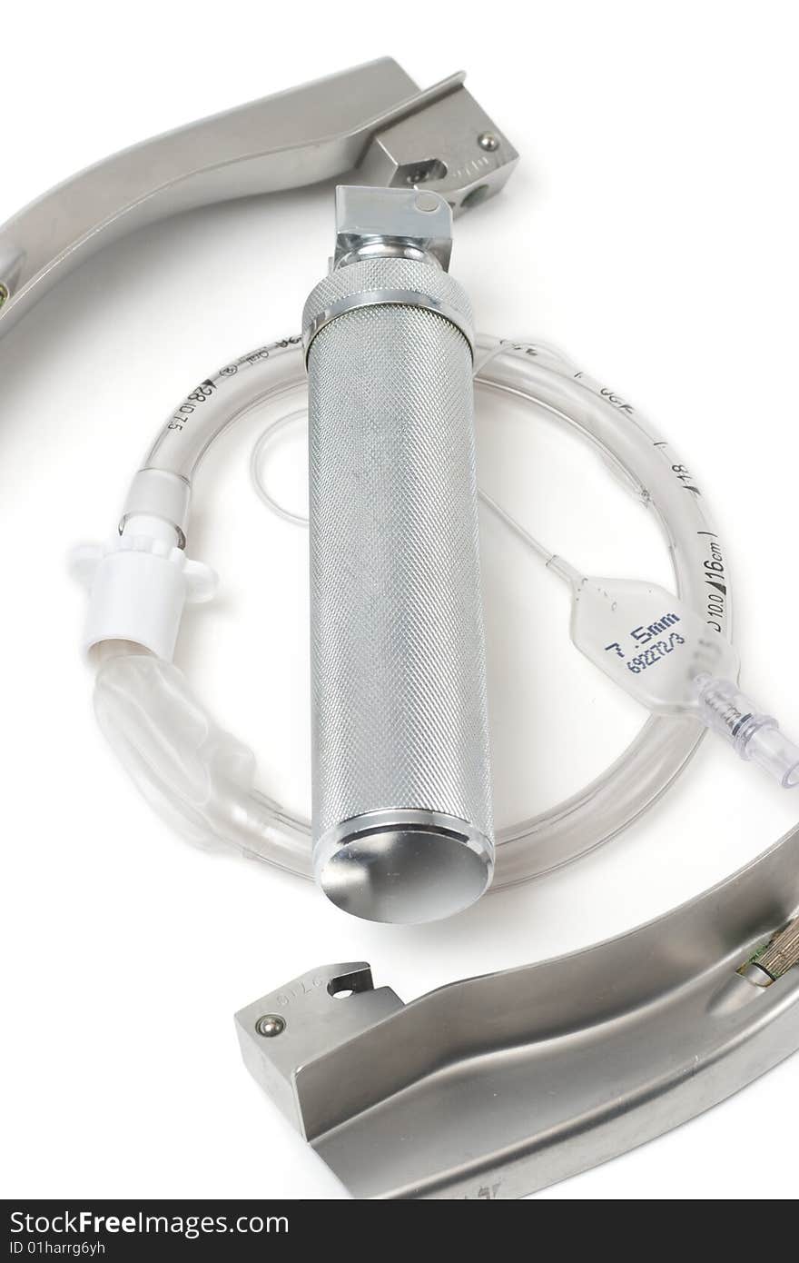 Laryngoscope and intubation tube, isolated on a white background