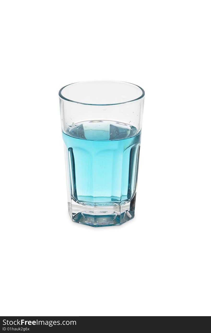 Glass full of blue liquid