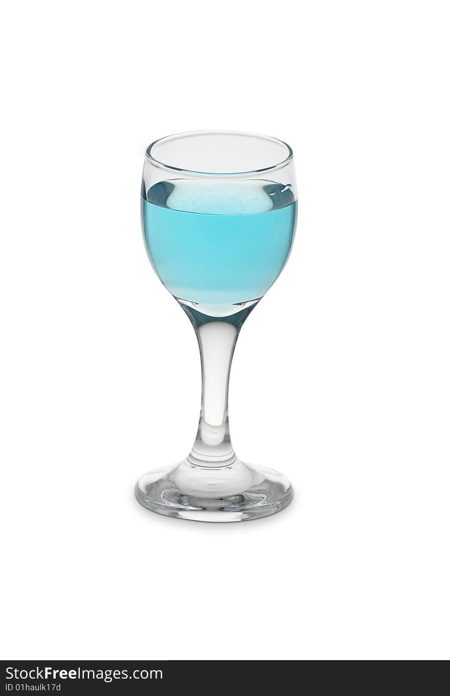 Small drinking glass full of liquid