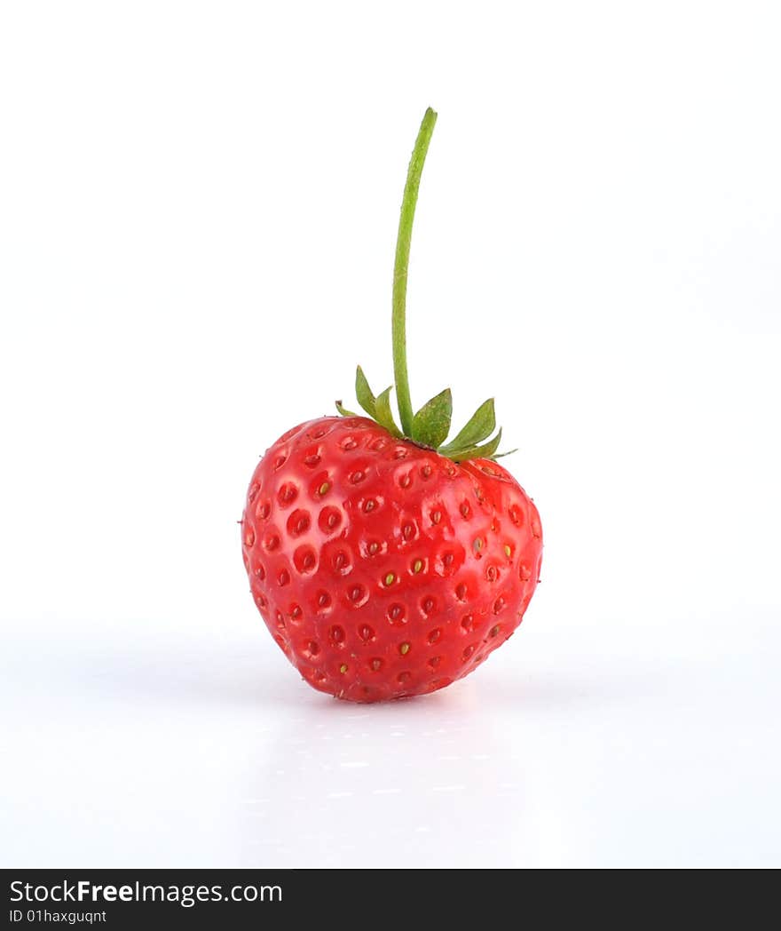 Close up of a strawberry. Isolated over white background