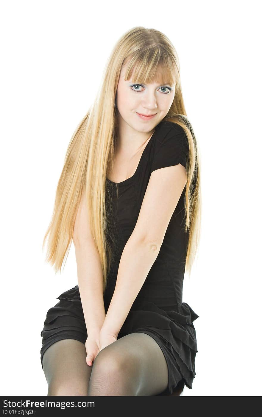 Portrait of a smiling blonde woman. Isolated on white background