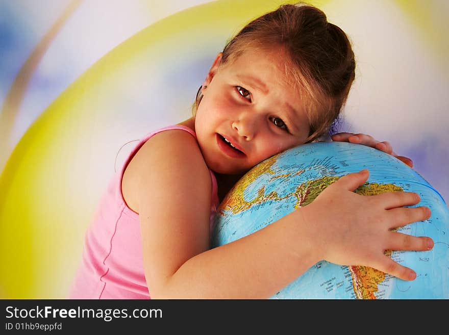 Girl is holding the world in his hands. Girl is holding the world in his hands